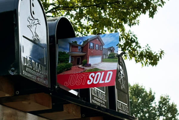 Just Sold postcard in mailbox