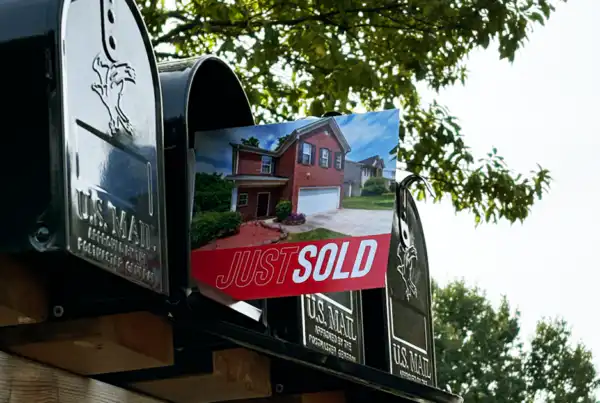 Just Sold postcard in mailbox