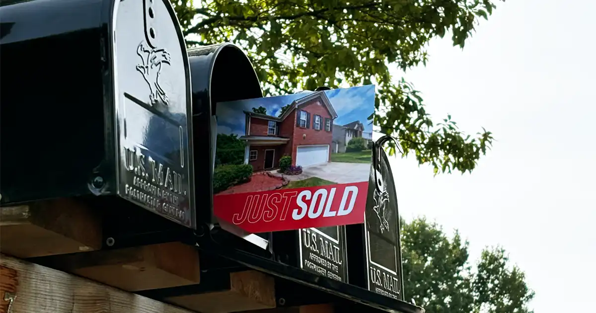 Just Sold postcard in mailbox